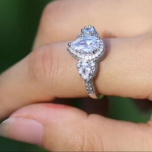 Pear shape women’s silver engagement wedding ring